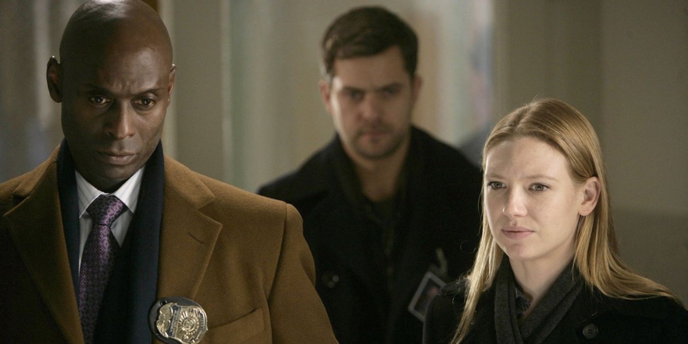 Olivia and Broils looking serious with Peter in the background