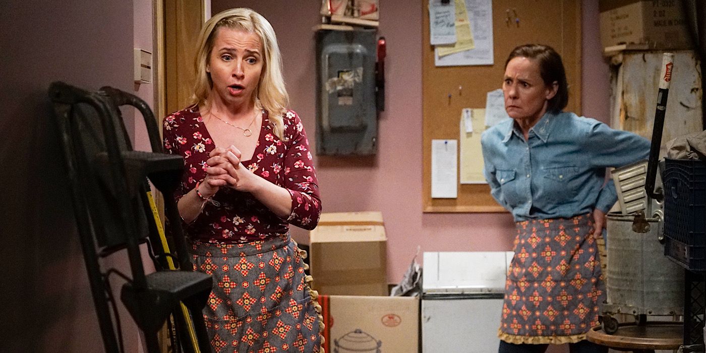 Becky and Jackie are standing in the backroom of The Lunch Box.