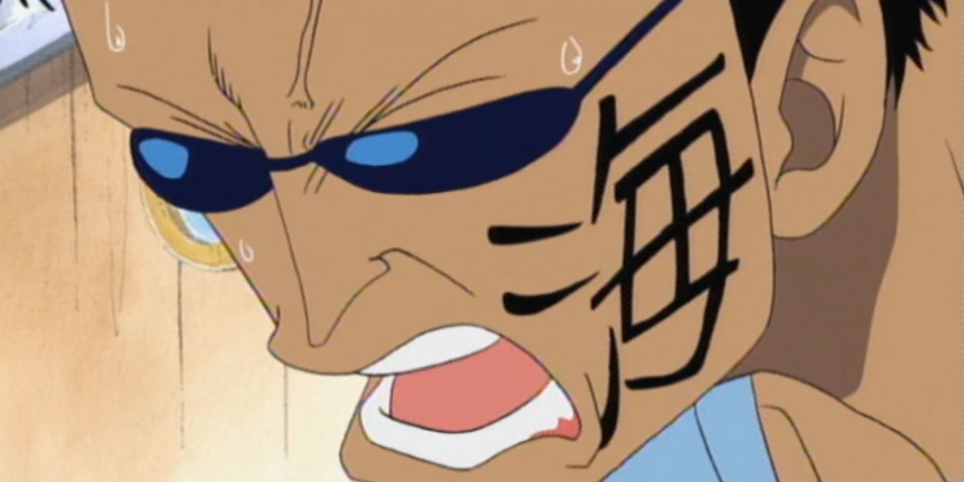 Johnny speaks intensely while looking down.