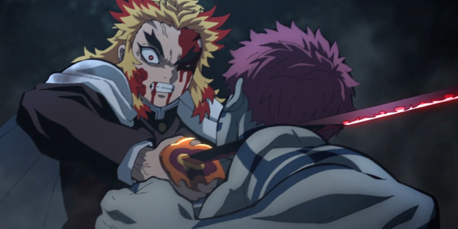 Kyojuro Rengoku is about to get punched by Akaza in Demon Slayer.