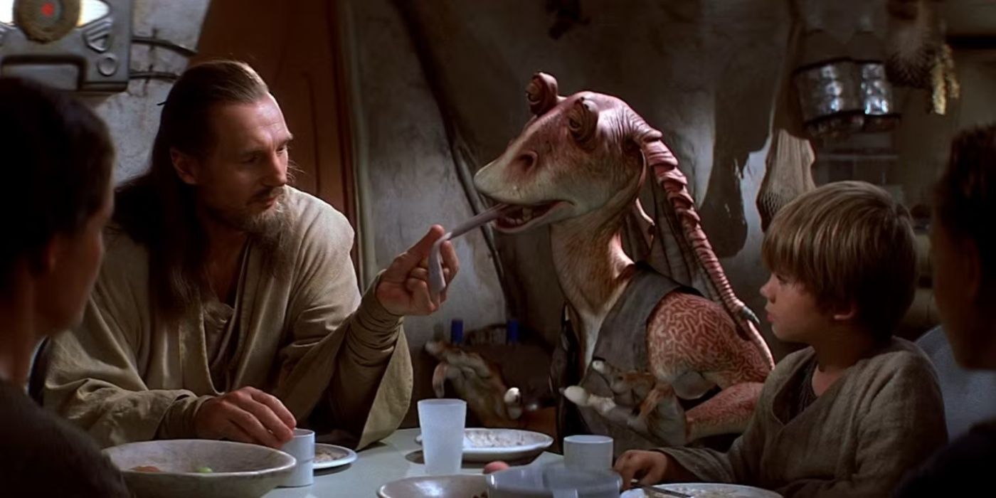 Qui-Gon Jinn puxa a língua de Jar Jar Binks enquanto Anakin observa