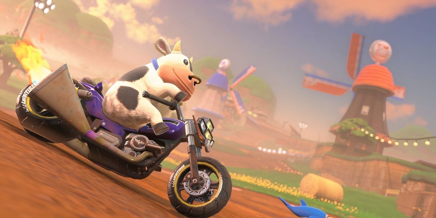 Cow leading to a motorcycle
