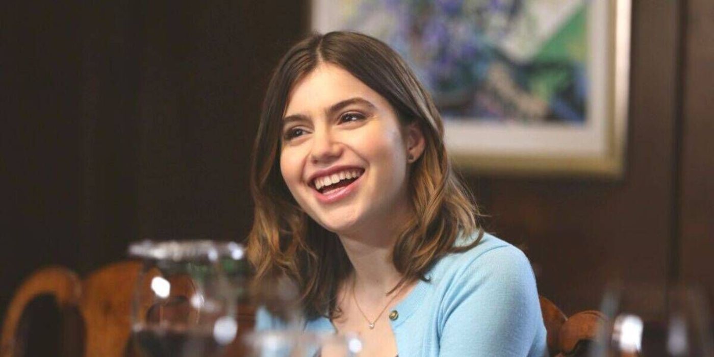 Nicky Reagan-Boyle smiling at someone offscreen in Blue Bloods