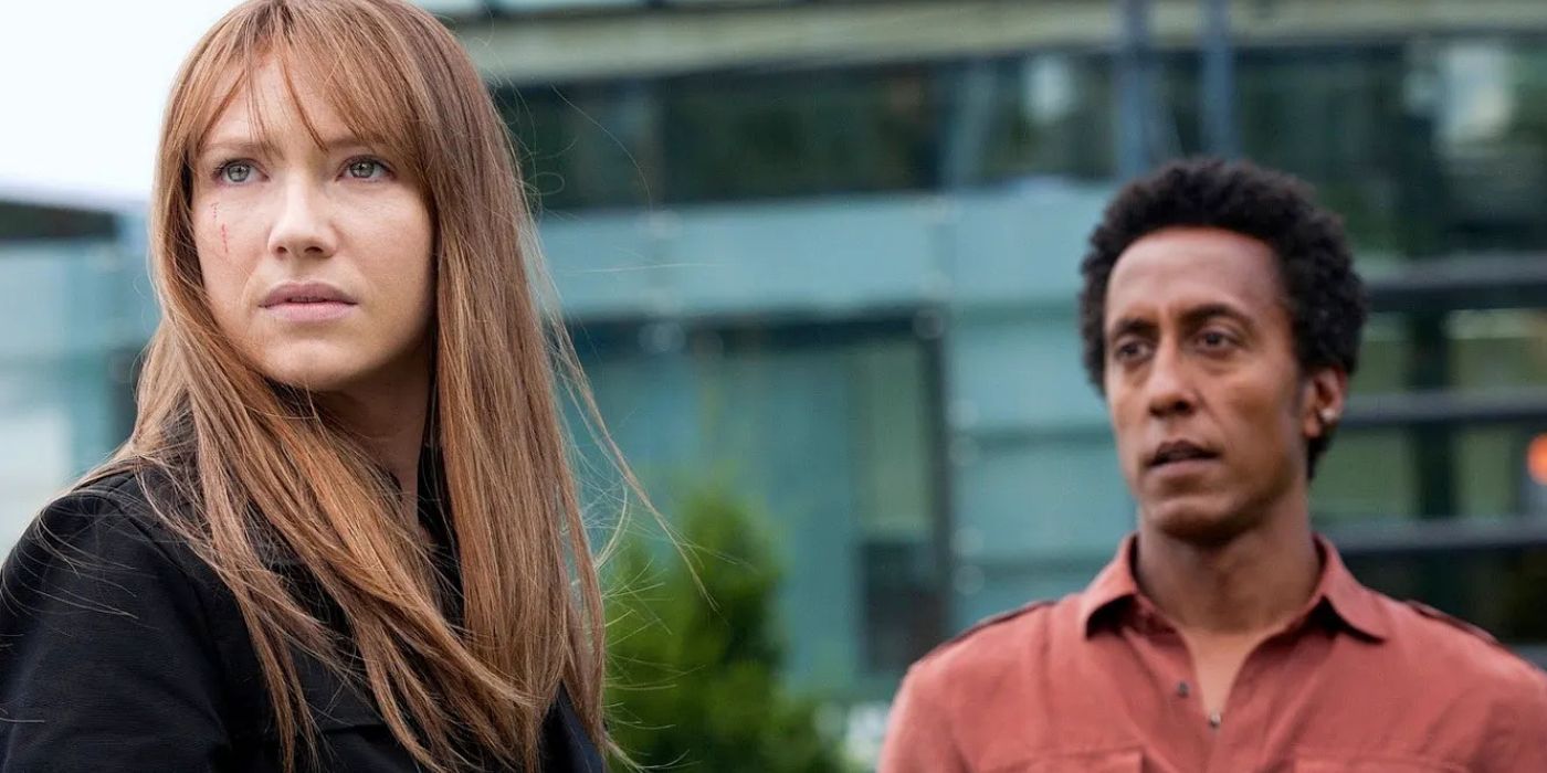 Olivia with bangs with Henry in the background