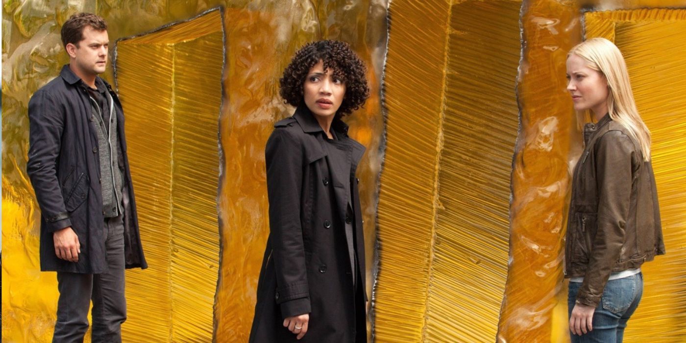 Peter, Astrid, and Etta standing in front of amber