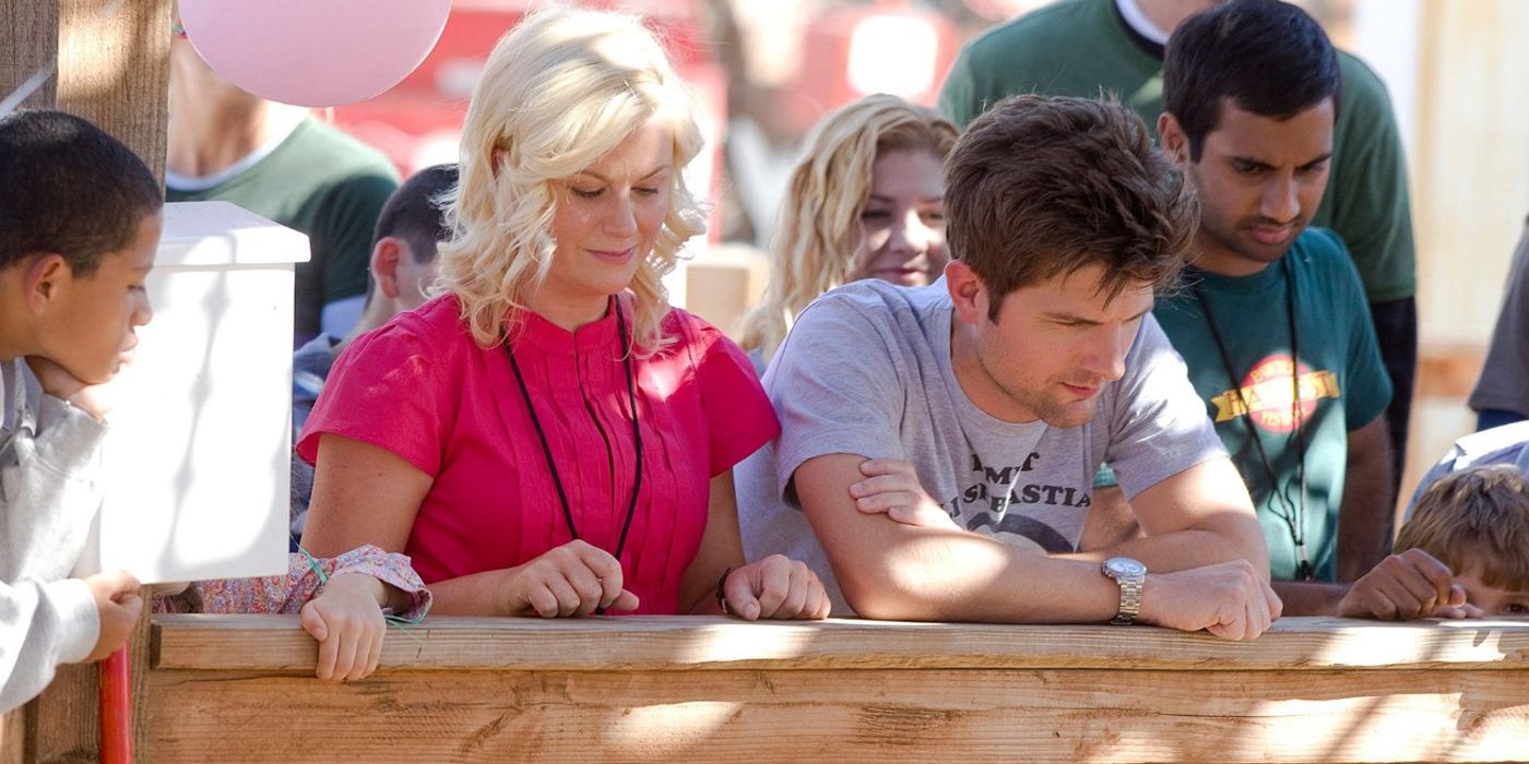 Leslie and Ben looking at a display at the Harvest Festival