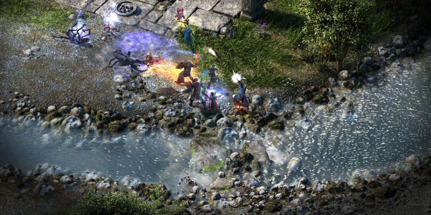 A combat gameplay still from Pillars of Eternity with the party fighting monsters next to a river.
