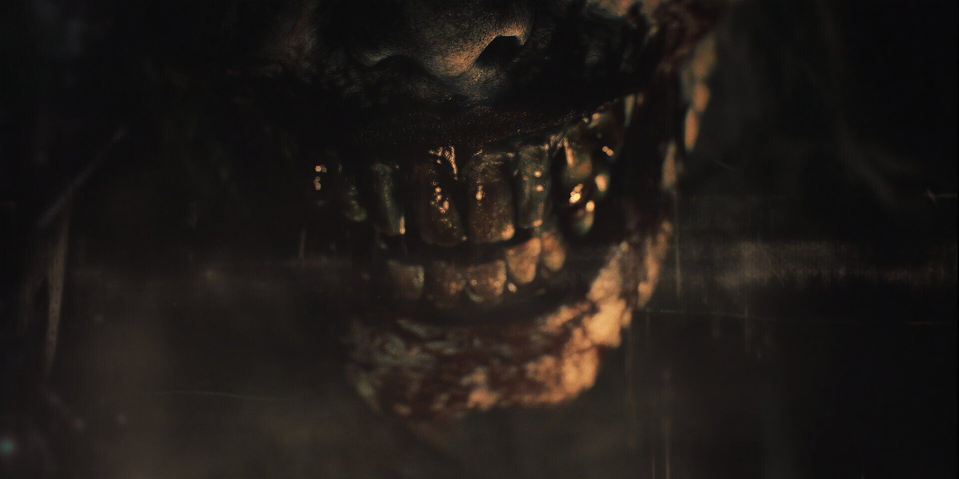 A close-up of a zombie's mouth in RE9