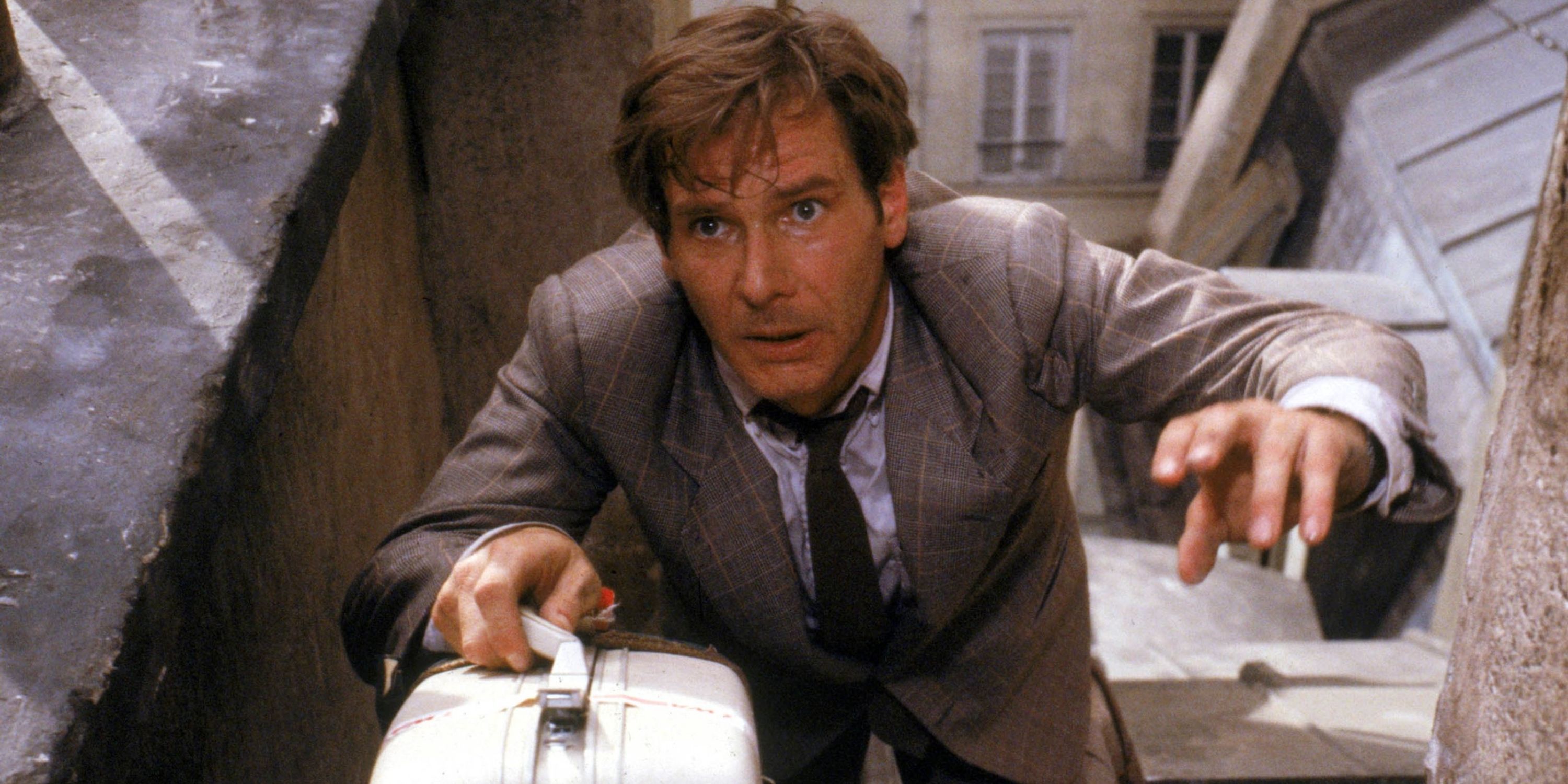 Harrison Ford as Richard Walker on a rooftop in Frantic 1988