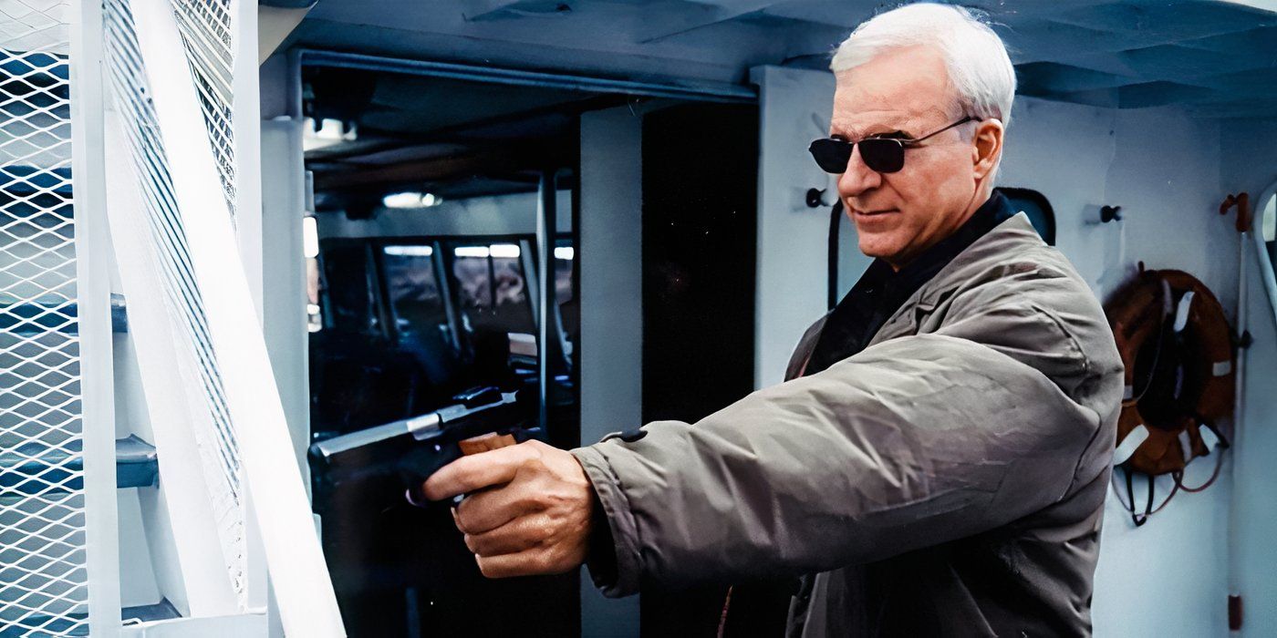 Jimmy Dell (Steve Martin) pointing a gun while standing on a boat