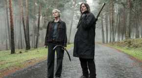 Carol Peletier (Melissa McBride) and Daryl Dixon (Norman Reedus) stand valiantly in The Walking Dead: Daryl Dixon Season 3