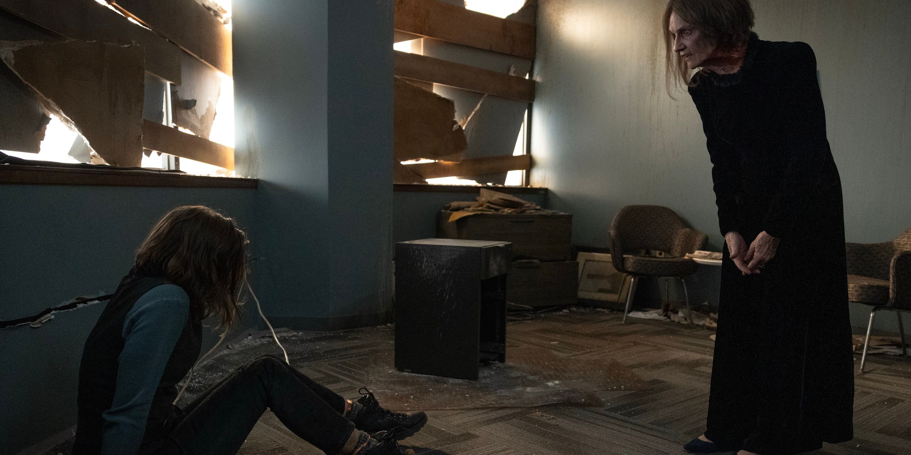 The Dama talking to a tied up Maggie Rhee on The Walking Dead: Dead City