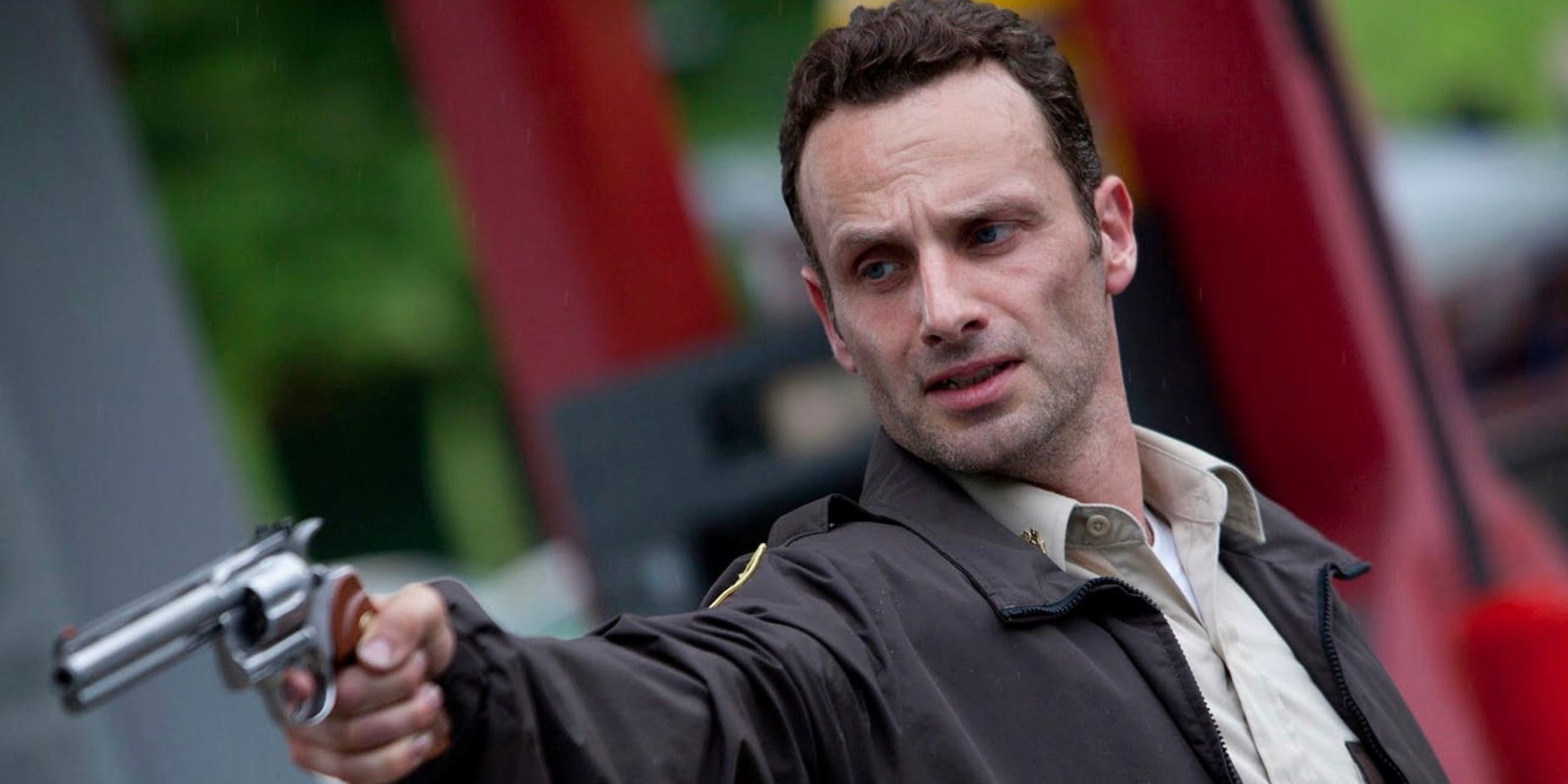 Rick Grimes pointing a gun on The Walking Dead