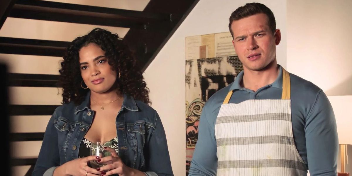 Natalia (Annelise Cepero) and Buck (Oliver Stark) stand in Buck's apartment in 9-1-1.