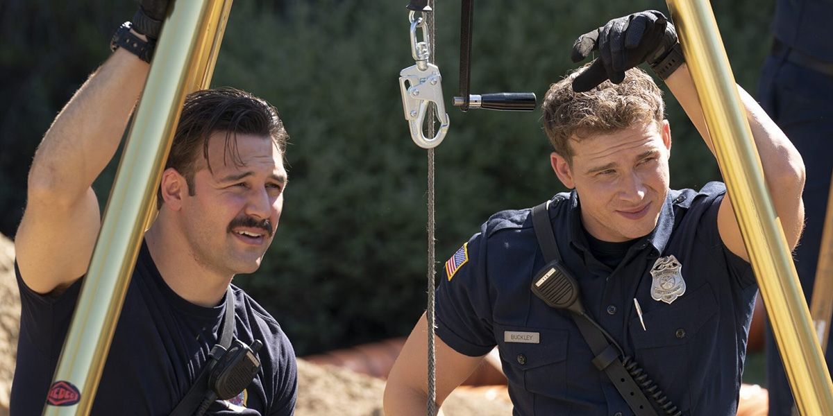 Eddie (Ryan Guzman) and Buck (Oliver Stark) prepare for a call on 9-1-1.