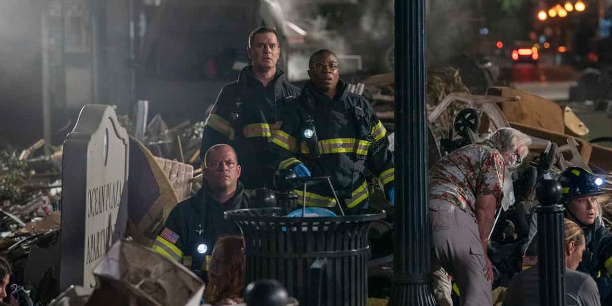 Captain Bobby Nash (Peter Krause) and paramedic Henrietta Wilson (Aisha Hinds) help tsunami survivors in 9-1-1's "The Searchers".