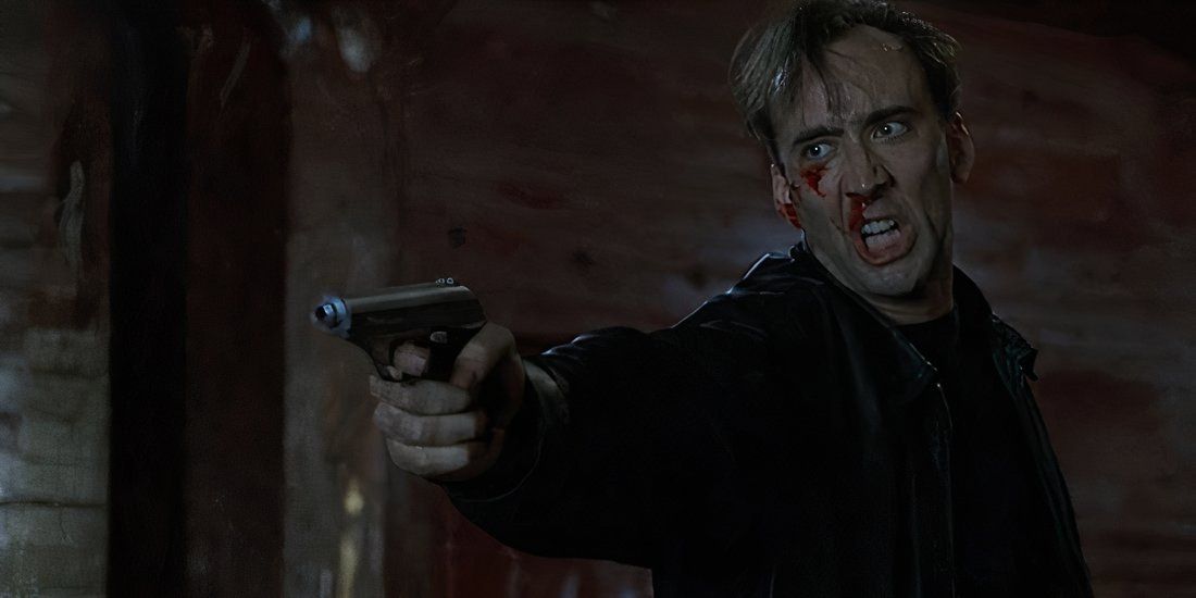 Nic Cage apontando uma arma em 8mm