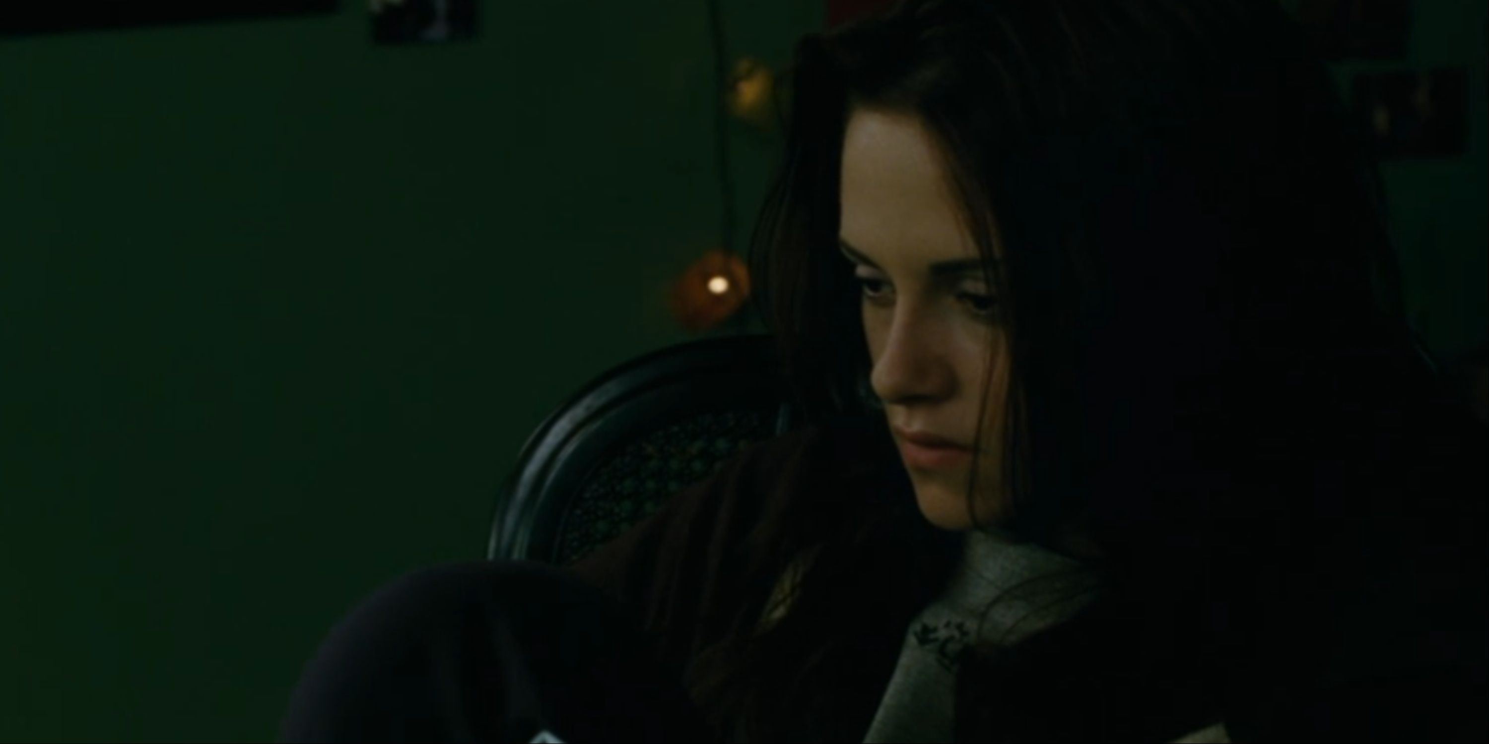 Bella looks through her window in the new moon
