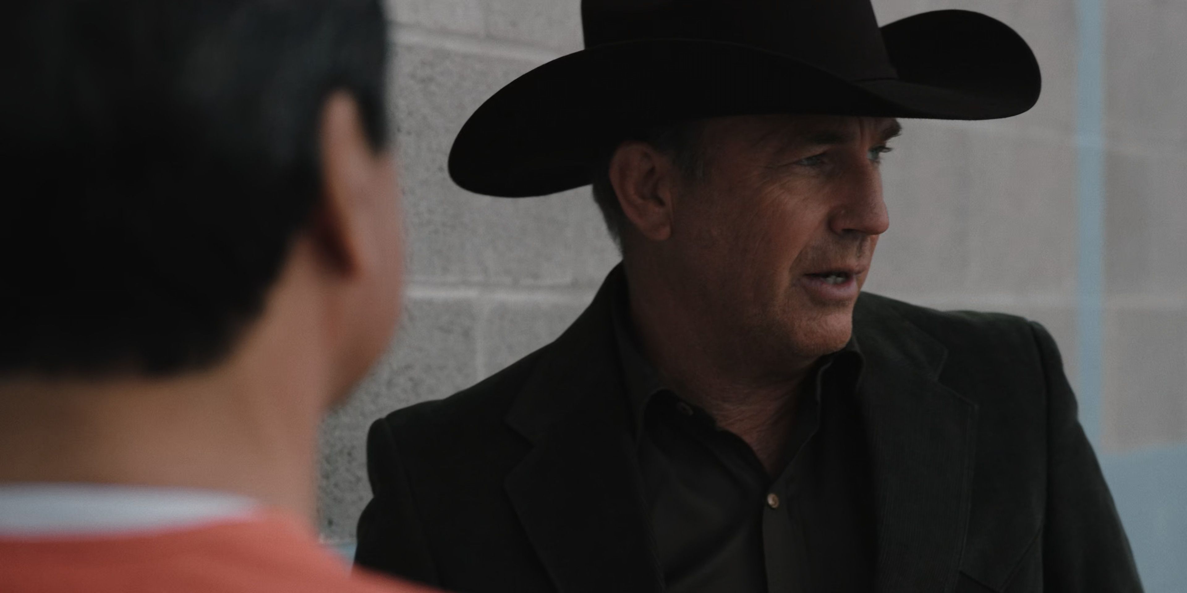 John and Thomas Rainwater converse in Yellowstone Season 1