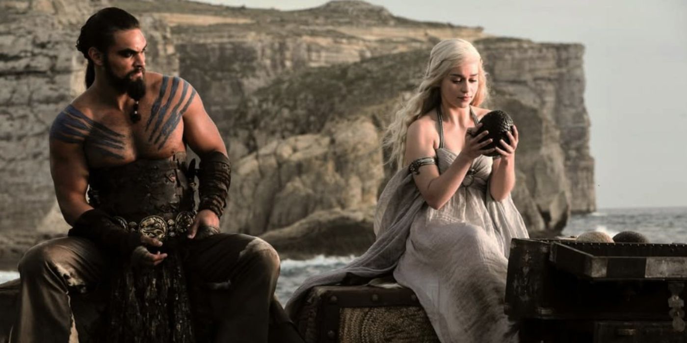 Jason Momoa as Khal Drogo with Emilia Clarke as Daenerys Targaryen looks at dragon eggs from the TV series Game of Thrones