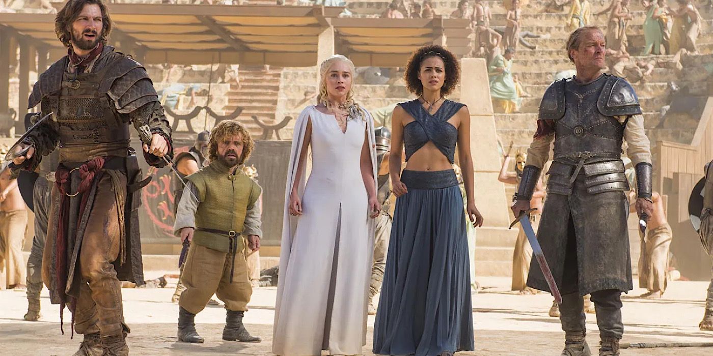  Daenerys Targaryen stand center with four of her followers on either side wielding their sword