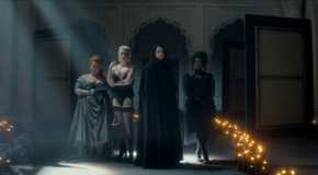 Despair, Desire, Dream, and Death standing together in candelit room in The Sandman Season 2, Part 1