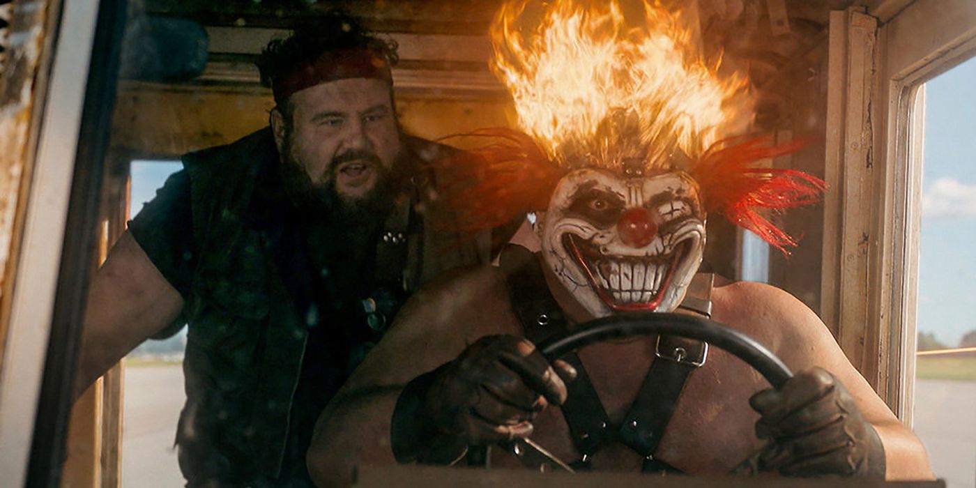 Sweet Tooth driving a truck with flames on his head in Twisted Metal