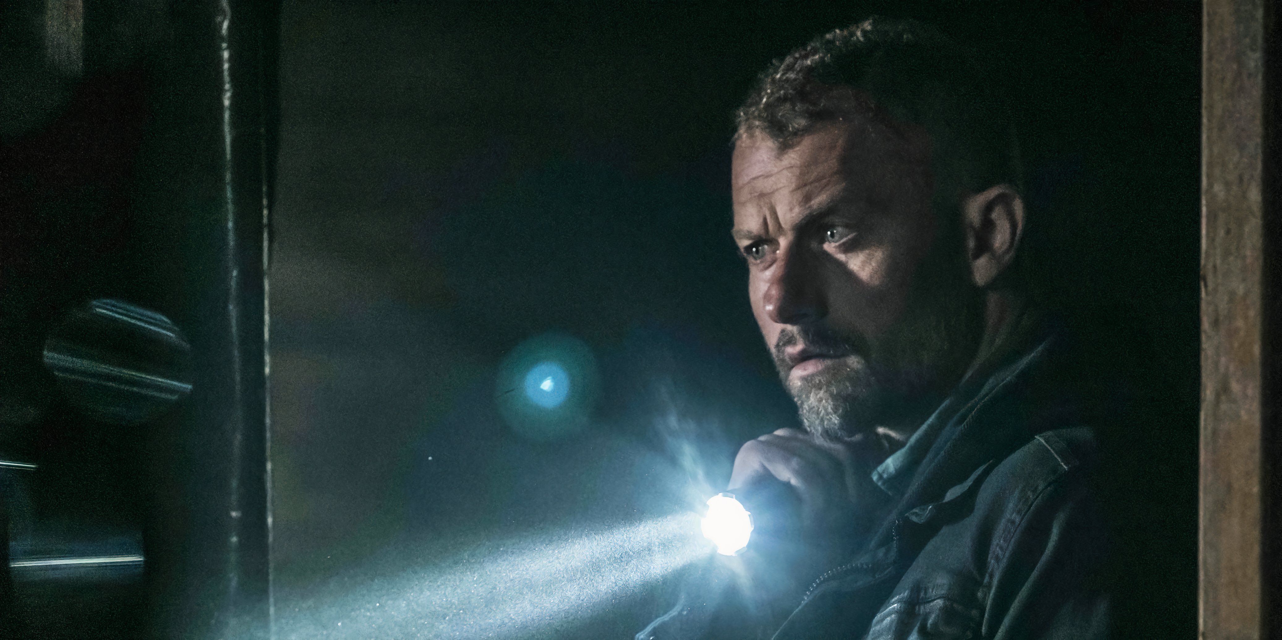 James holds a flashlight and investigation in the empty man