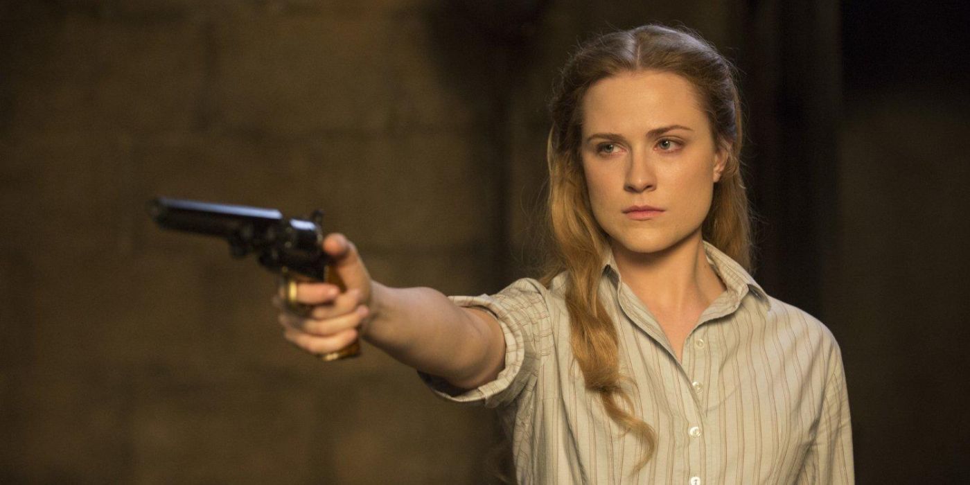 Evan Rachel Wood as Dolores Abernathy pointing a gun from the TV series Westworld