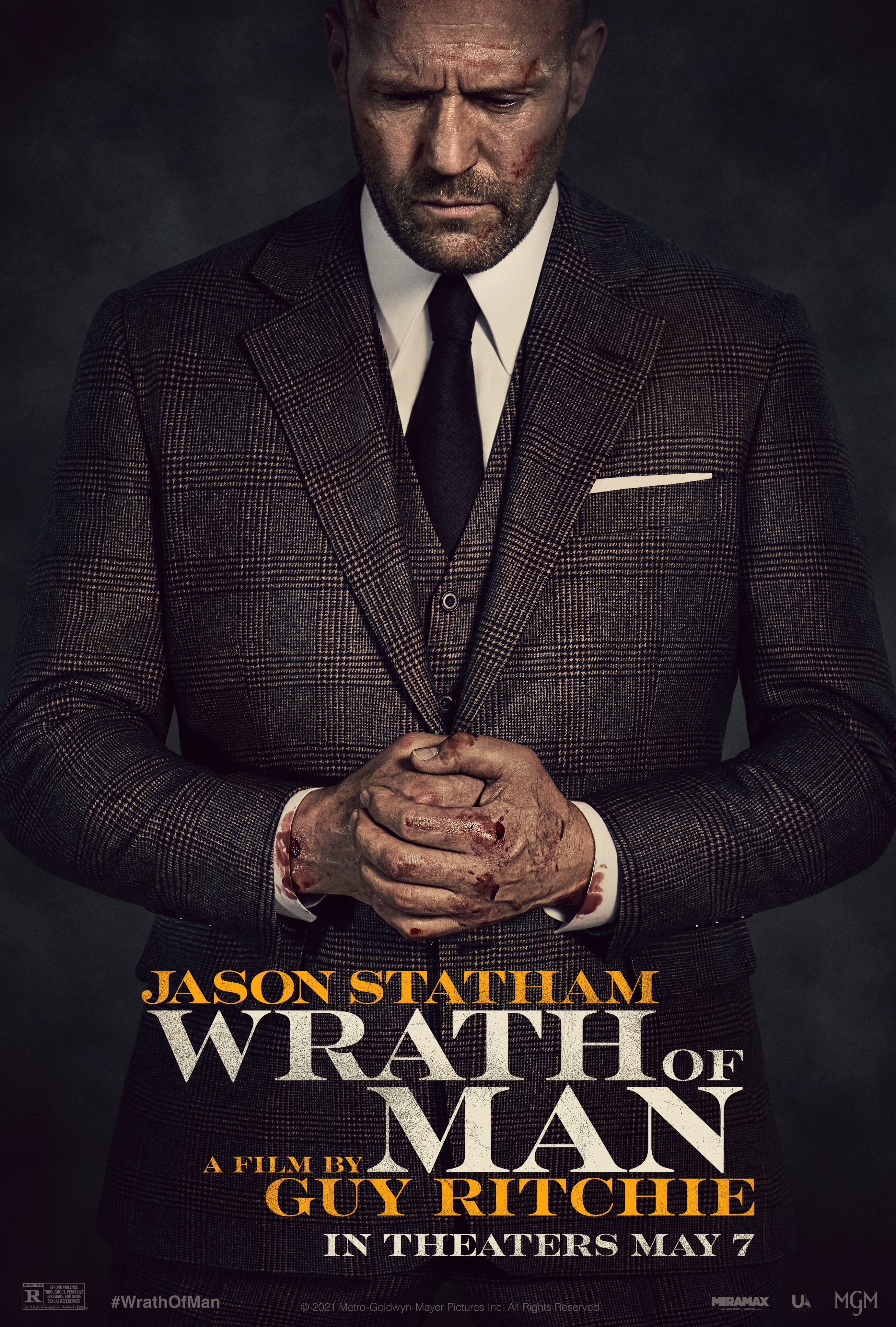 H (Jason Statham) is wearing a suit and has bloody hands on the poster for Wrath of Man.