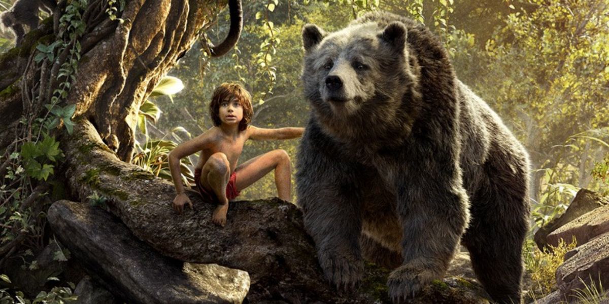 Mowgli and Baloo on a tree branch